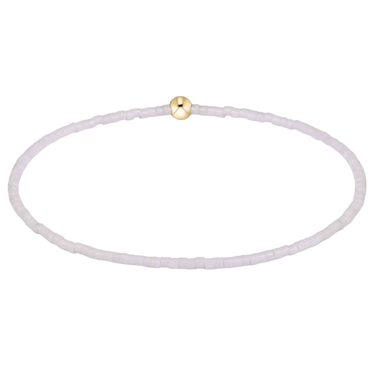 A delicate beaded bracelet with small, translucent pale lavender beads and a single polished gold clasp, shown on a clean white background.