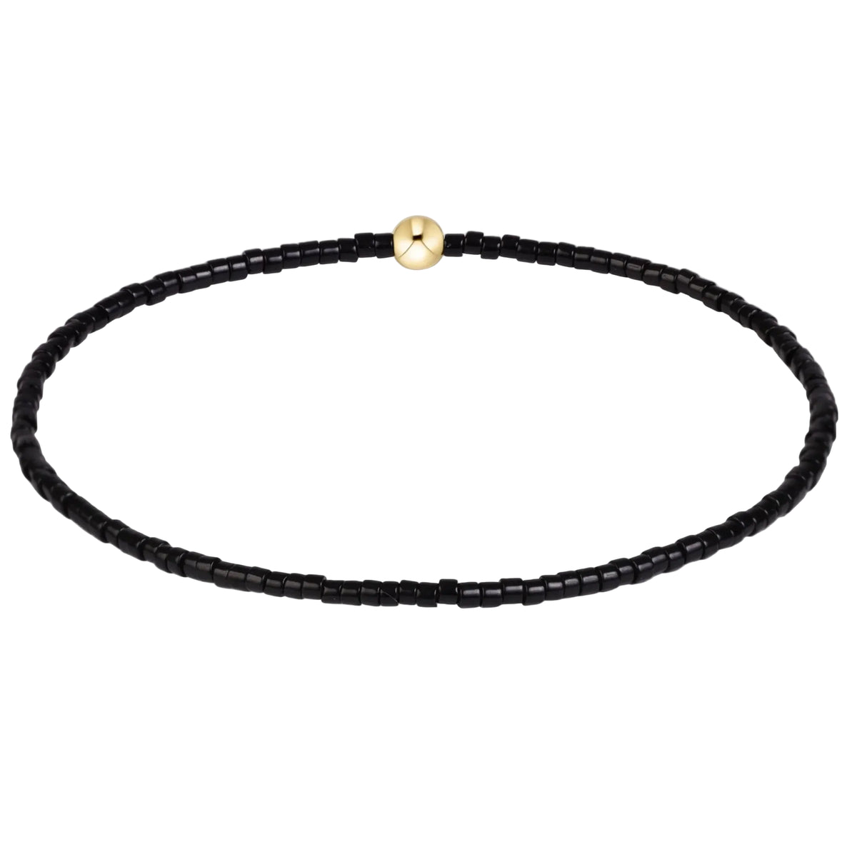 A beaded necklace made of small black faceted beads with a single round gold clasp, displayed on a clean white background.