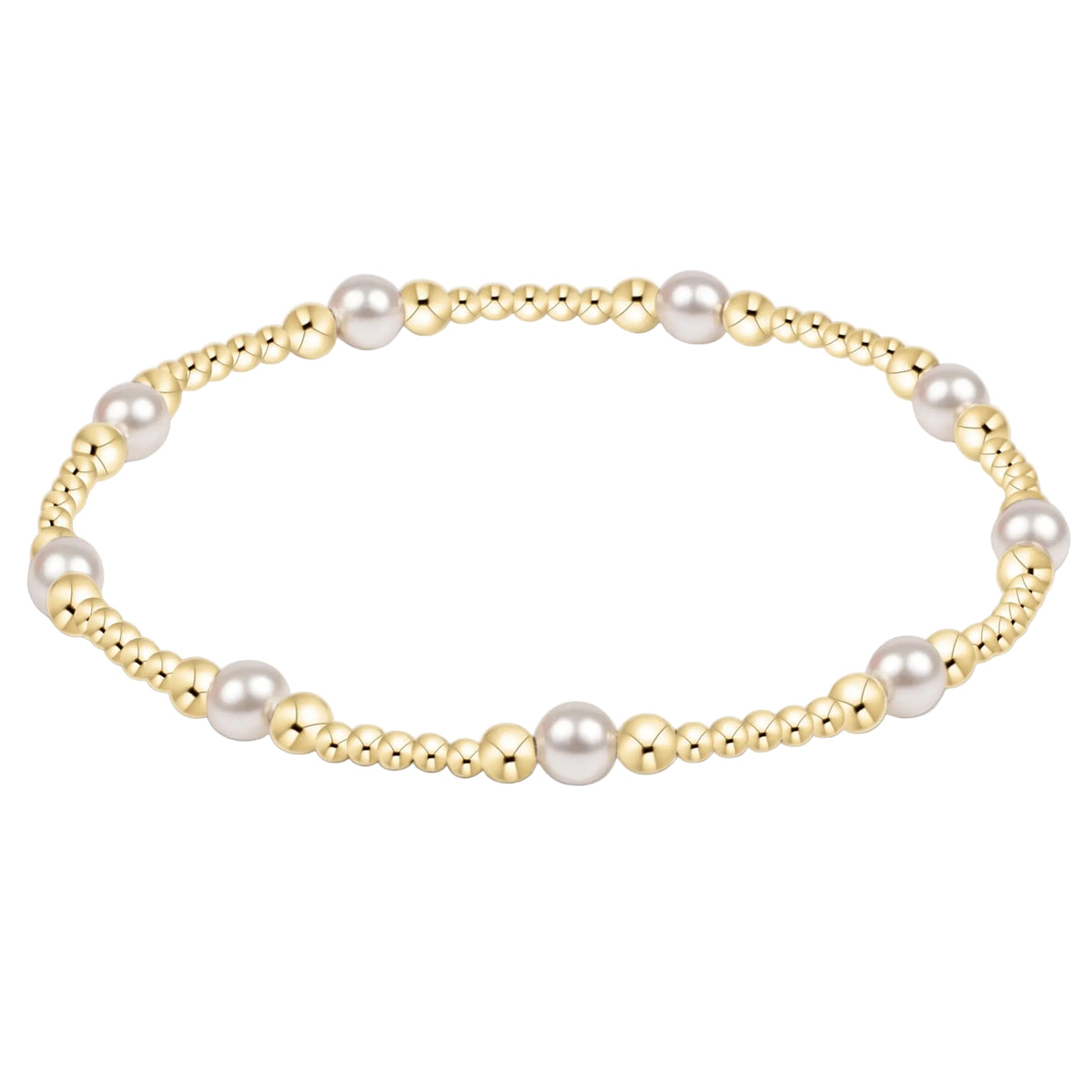 Pearl bracelet with gold accents on a white background